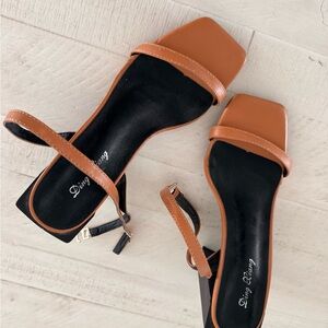 Elegant Tan and Black Heels